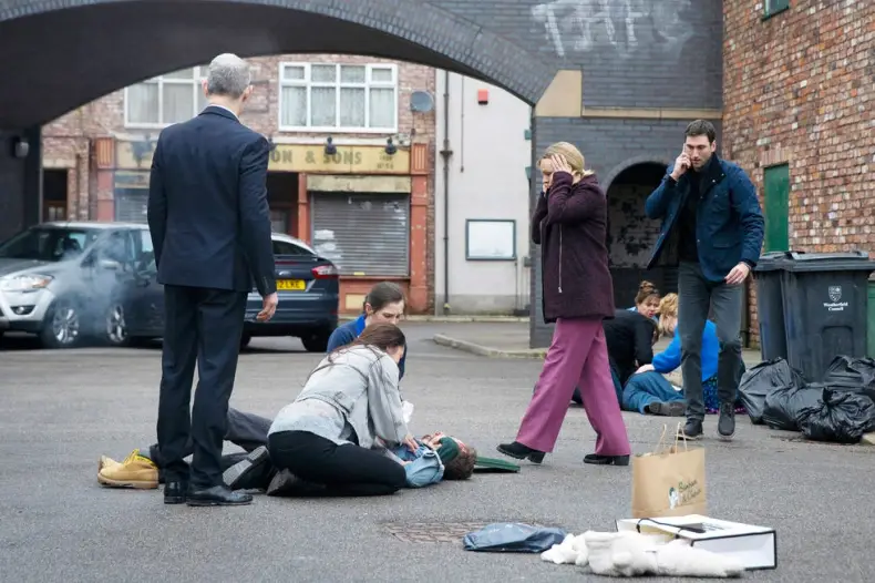 Coronation Street Mystery: A mysterious note discovered close to the accident scene says “Check under 13.” Who left it and what is its significance?